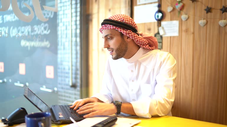 Portrait of Arab Middle East man at his small business